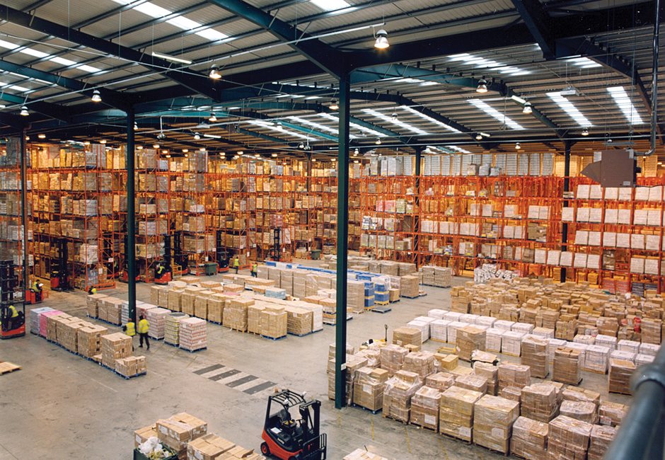 Palletized freight stored safely inside Courex warehouse racks